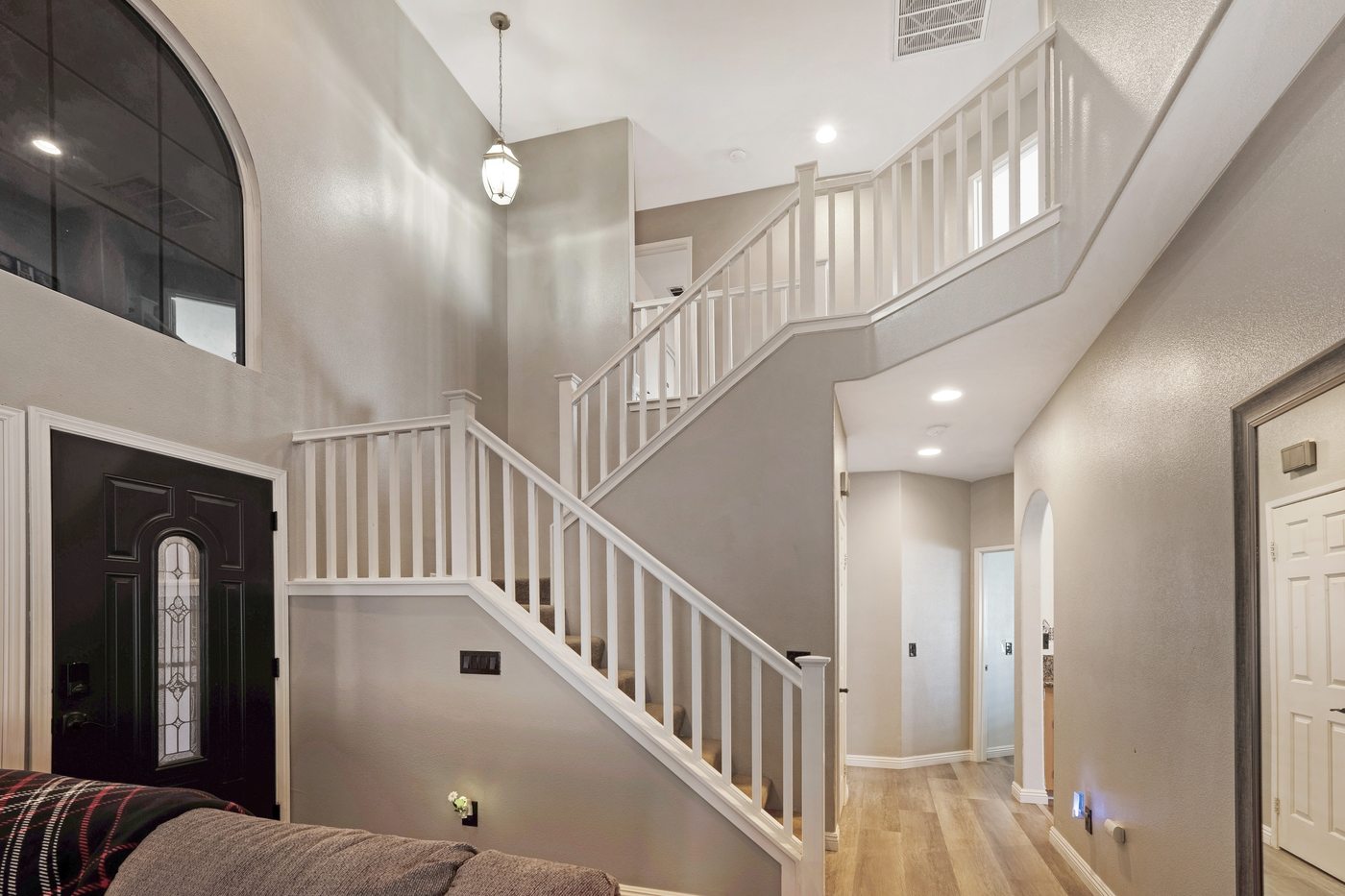 Bright modern entry staircase